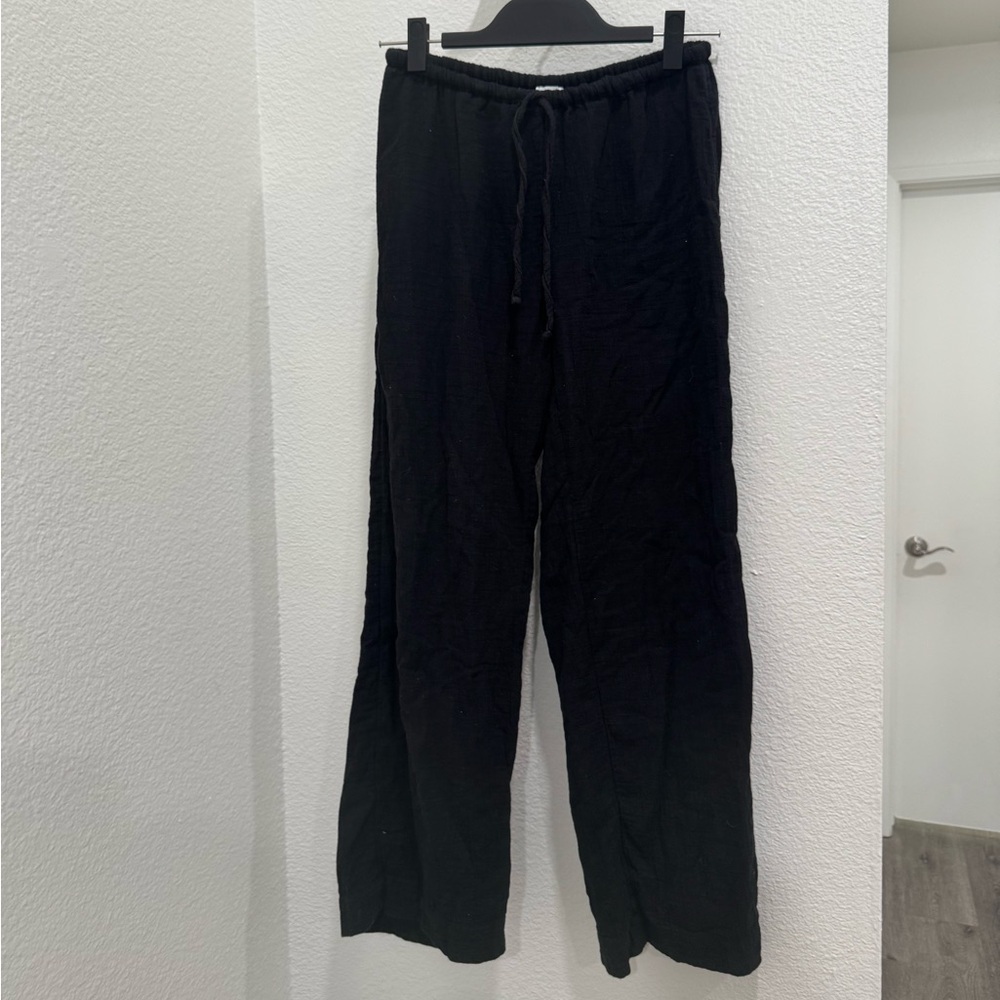 Women’s black Princess Polly wide leg black pants. Size:US 4.